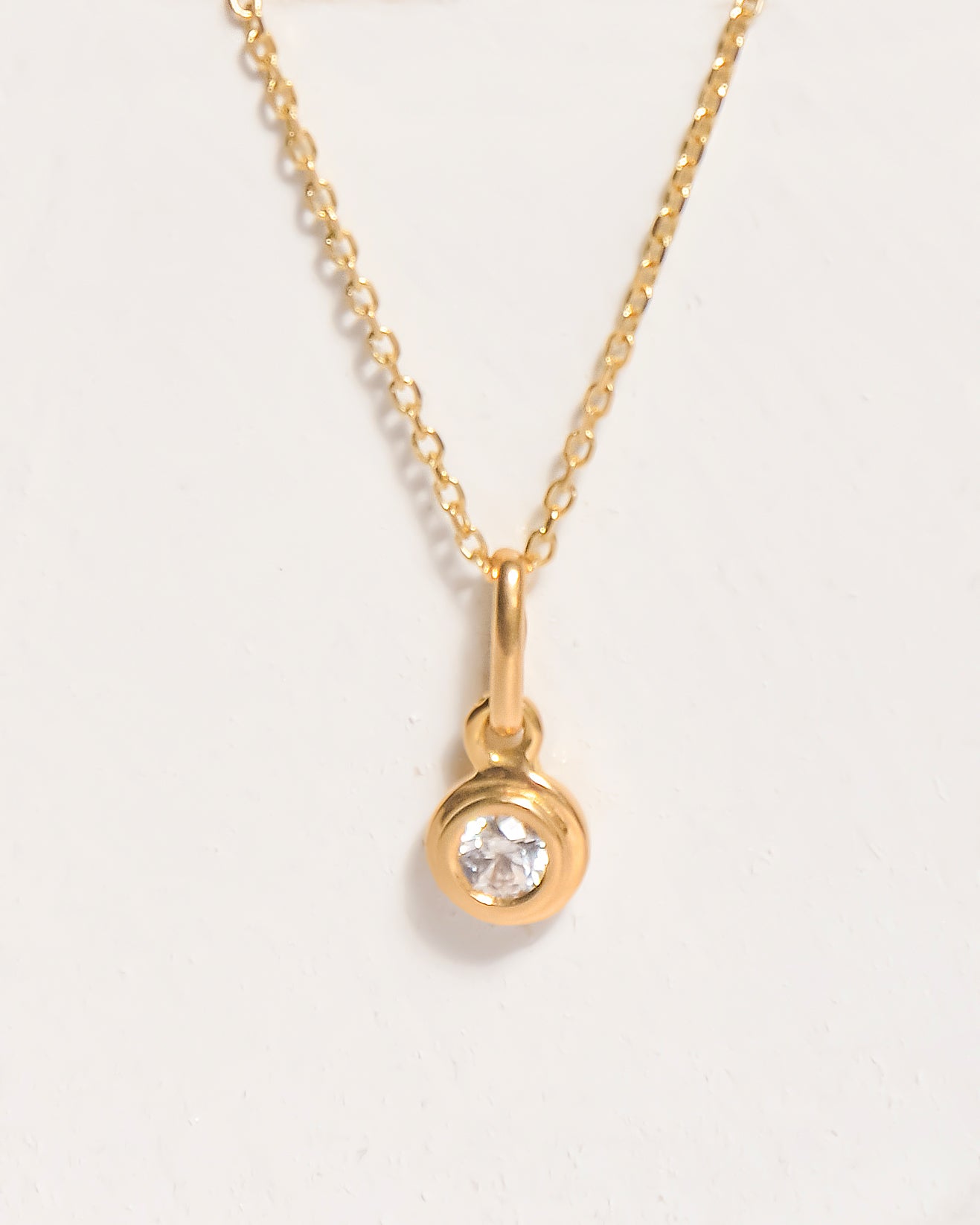 Dije Punto de Luz Oro 18k