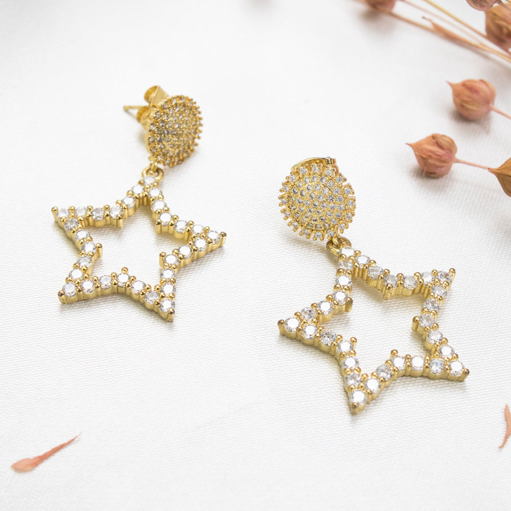 aretes de estrella, aretes dorados de estrella con piedras, aretes con brillos, aretes dorados