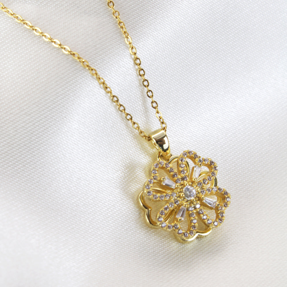 Collar de trébol giratorio dorado con piedras. collar antiestrés. collar anti ansiedad. collar de trébol