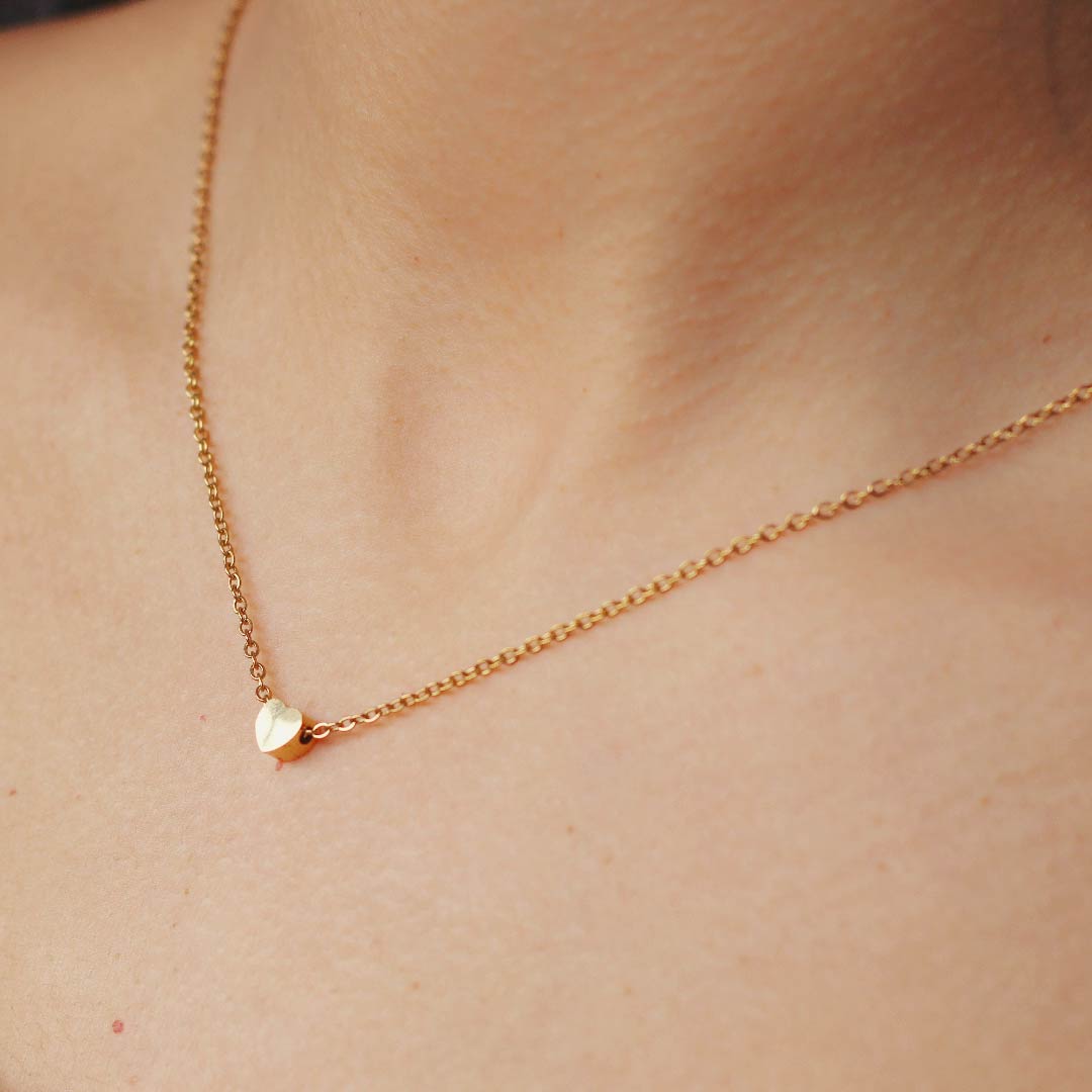 Collar corazón baño oro pasante