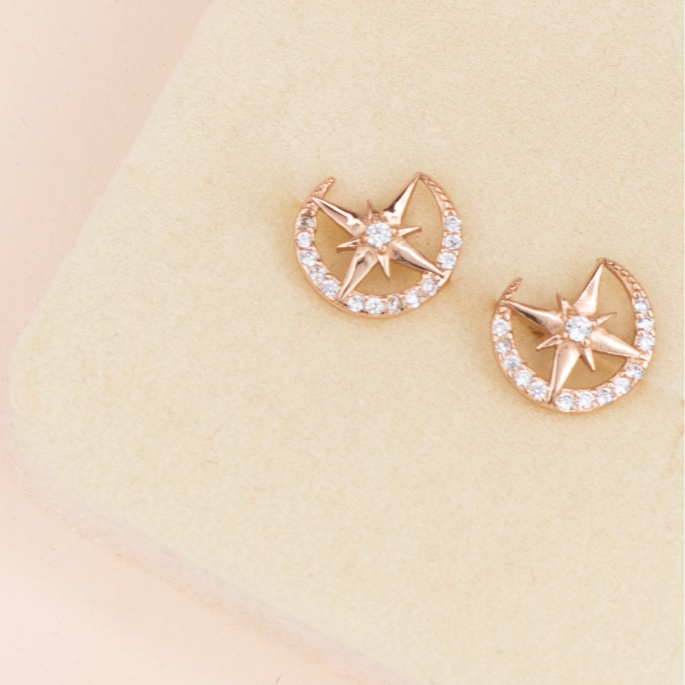 aretes pegados, aretes de estrella, aretes rosados de estrella, aretes con piedras y estrellas