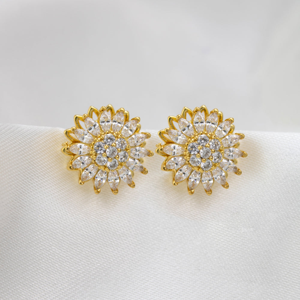 aretes de girasol, aretes giratorios, aretes antiestrés , aretes anti ansiedad, aretes dorados con piedras