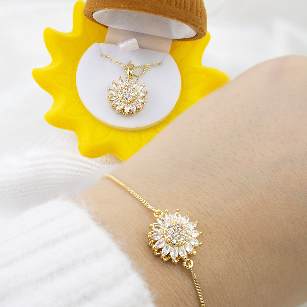 Box Premium 4 piezas Girasol: Collar + Arete + Pulsera + Anillo Girasol Giratorio