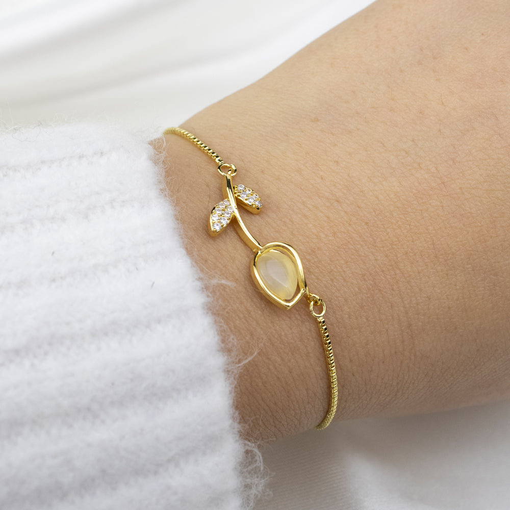 Pulsera ajustable Tulipán dorada con detalle floral elegante